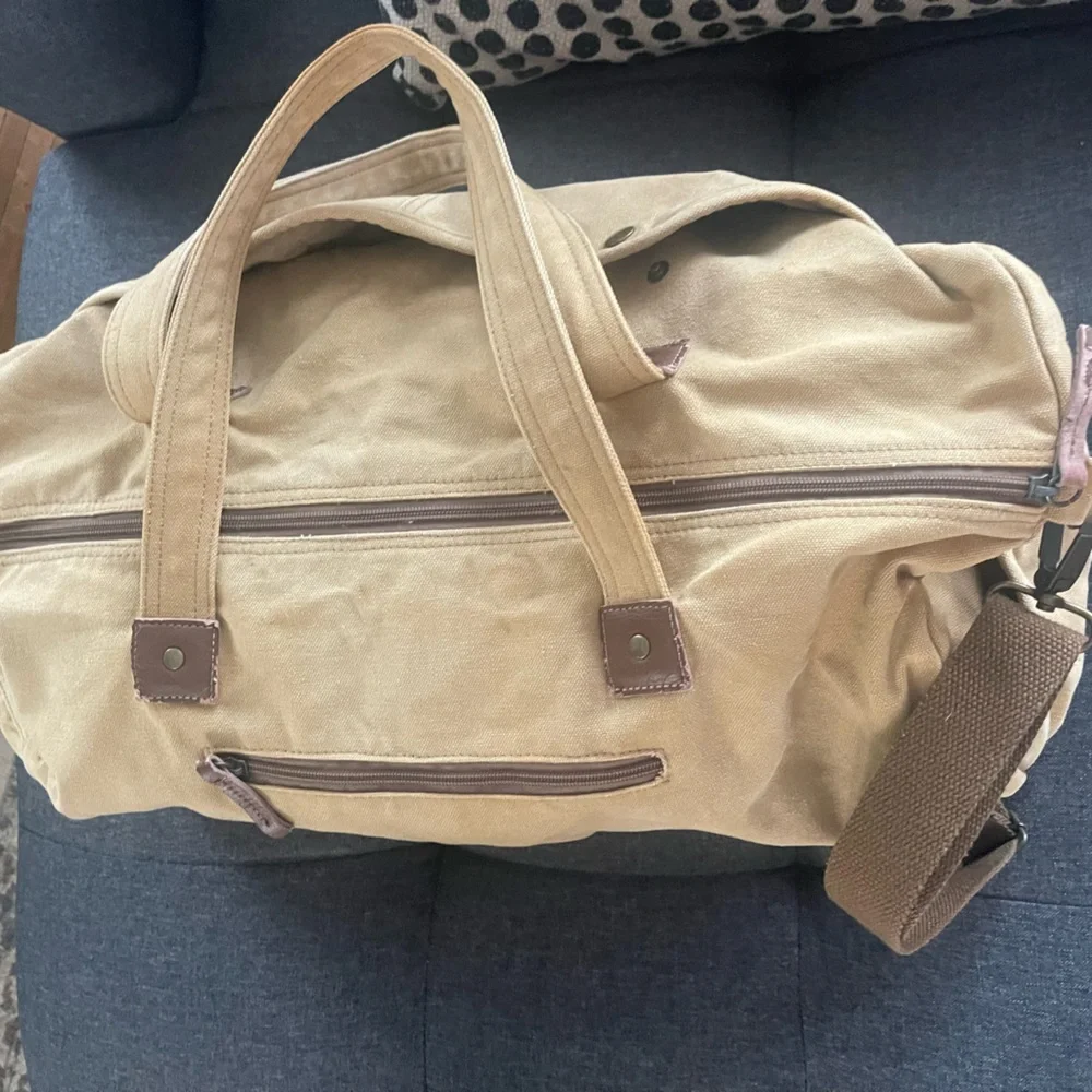 Canvas utility duffle travel bag .